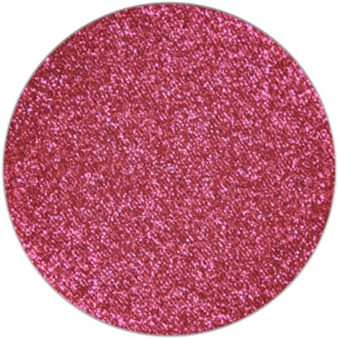 En rund rosa glitteryta med många glänsande partiklar som skapar en glittrande effekt.