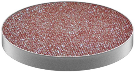 A round, flat object with a sparkly, pink surface and a silver border, resembling an accessory or decorative item.