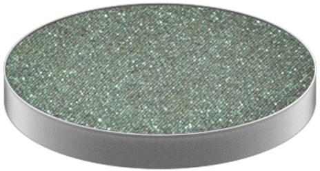 A round object with a shiny, glittery green surface and a silver edge.