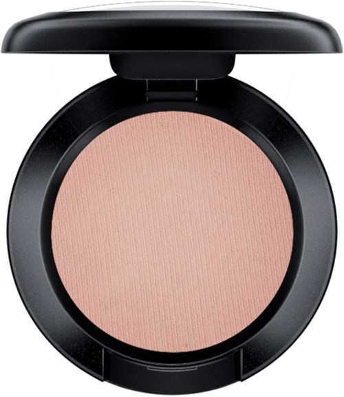A compact blush in a black round case, with light pink color inside.