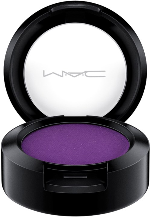 A purple eyeshadow in a compact from MAC Cosmetics with a black round case and open lid.
