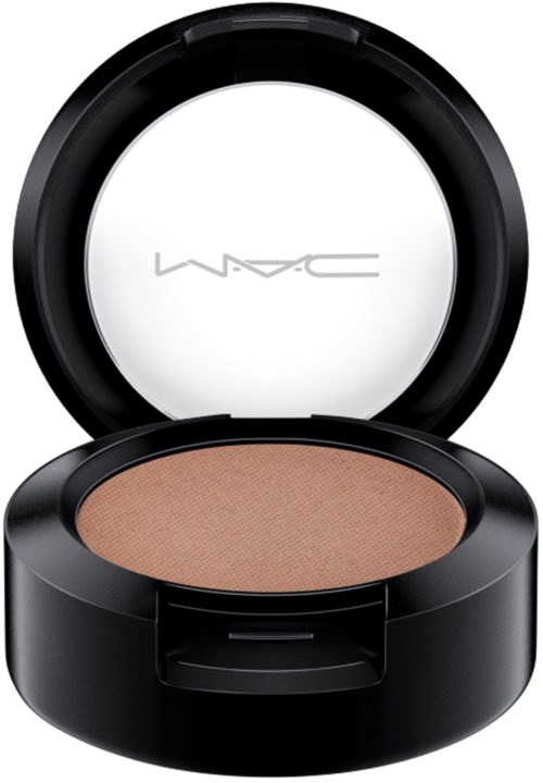A compact, round makeup powder with a black case and a mirror inside the lid.
