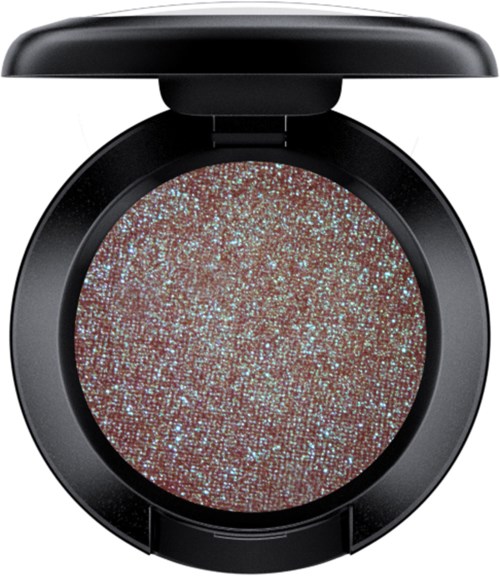 A compact round makeup container with shimmering, glittery eyeshadow inside and a black lid open.
