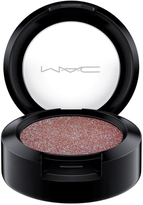 A black round makeup container with a white lid, containing sparkly pink eyeshadow. The brand MAC is on the inside of the lid.