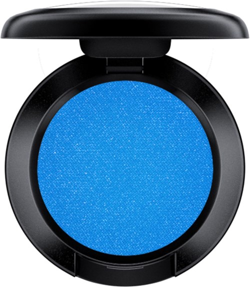 Blue eyeshadow in a round black container with a lid. Shimmery and vibrant color inside.