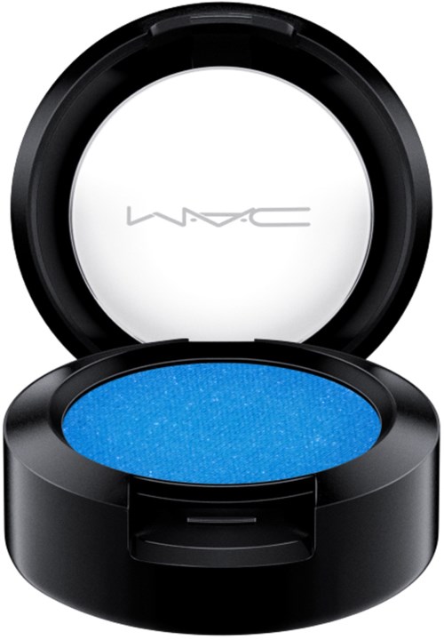 A blue eyeshadow with a black round case and a clear lid showing the MAC logo inside.