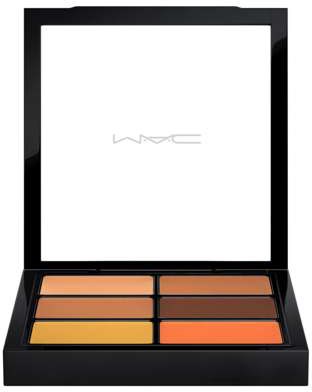 En makeup-palett med sex färger: beige, brunt, orange, gult, mörkbrunt och orange. MAC-logga på spegeln.
