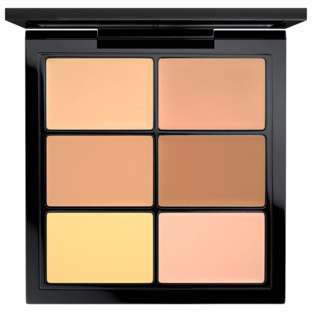 En makeuppalett med sex olika nyanser av foundation eller concealer i svart fodral.