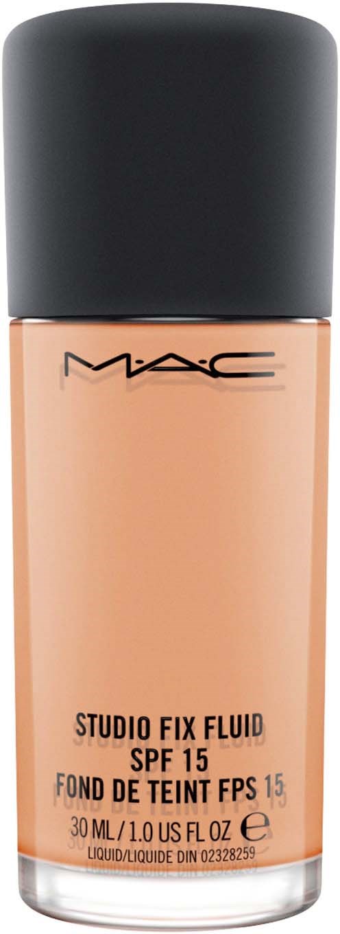 En foundationflaska med svart lock, persikofärgad produkt och MAC-märke, märkt som Studio Fix Fluid SPF 15.