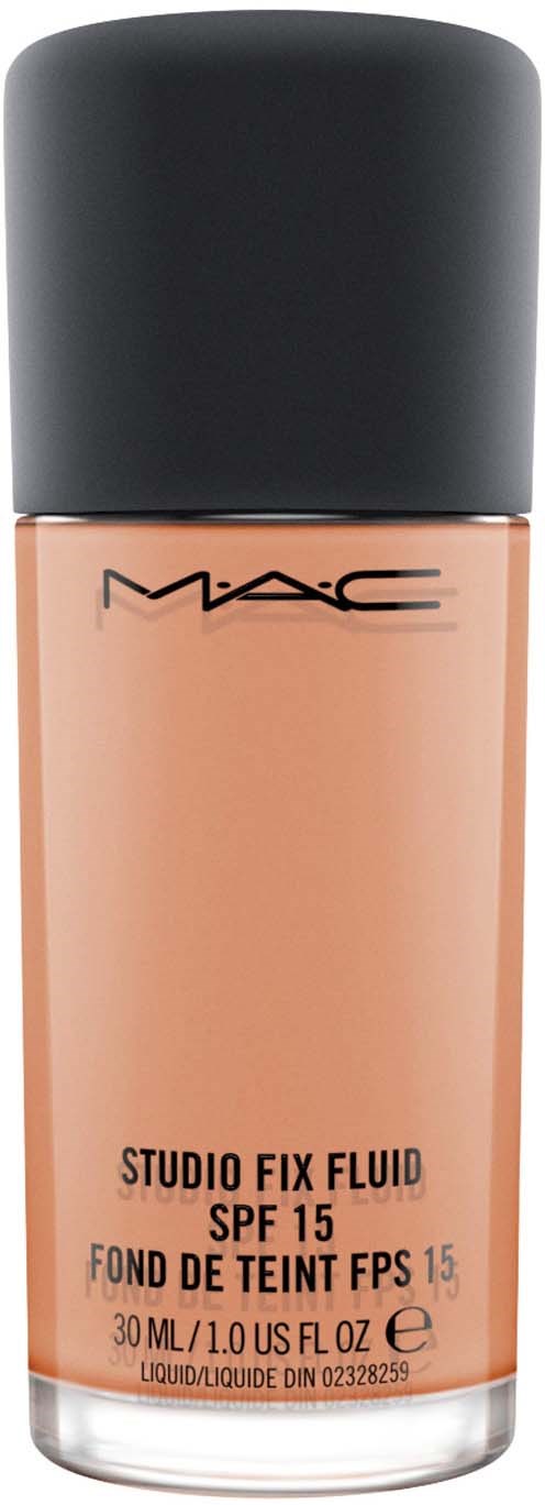 En flaska MAC Studio Fix Fluid Foundation med SPF 15 i en aprikosfärg och svart lock.
