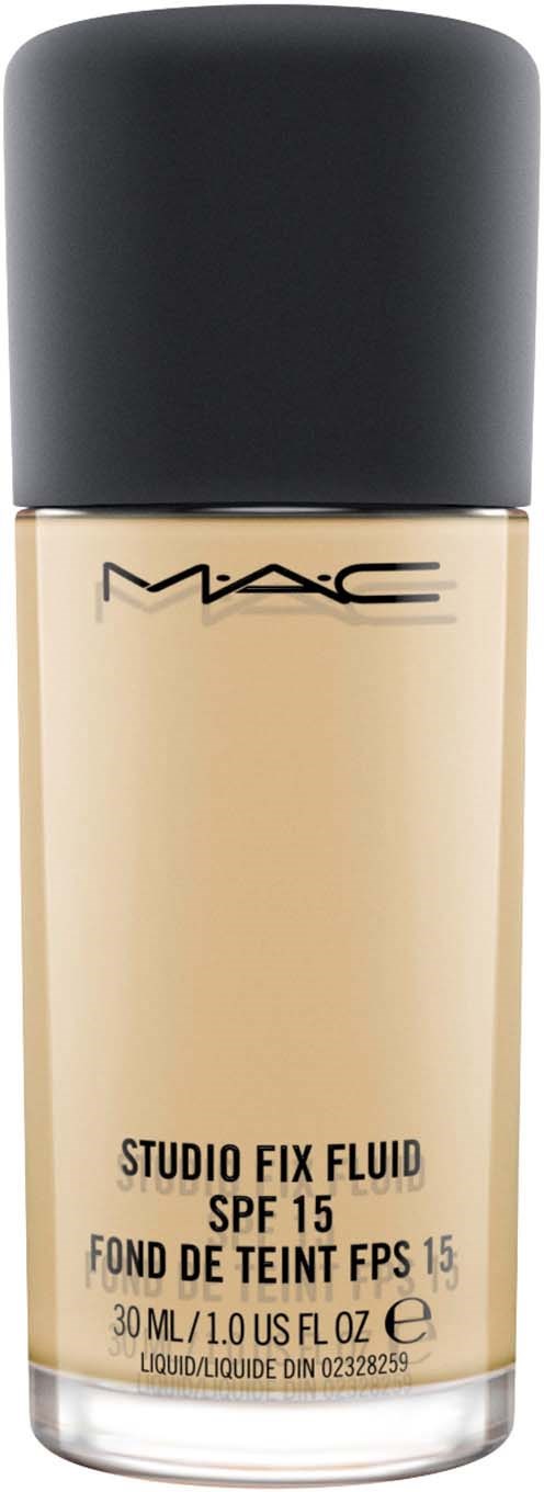 En beige foundationflaska med svart lock. Etiketten visar MAC, Studio Fix Fluid, SPF 15, 30 ml.