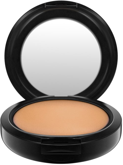 En svart liten burk med spegel inuti och beige puder eller grund på botten.