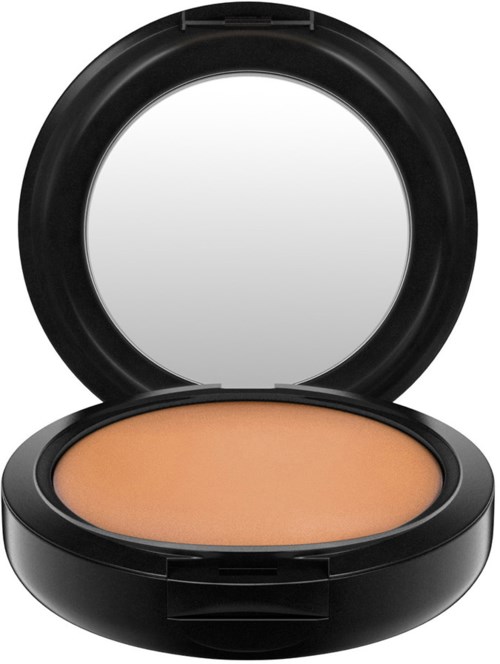 Ett kompakt makeupprodukt med rund form, med persikofärgad puder och en spegel i locket.