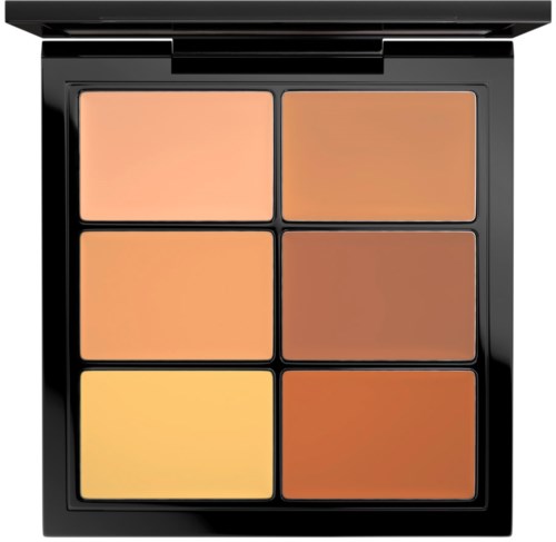 En palett med sex nyanser av concealer i olika hudtoner från ljus till mörk.