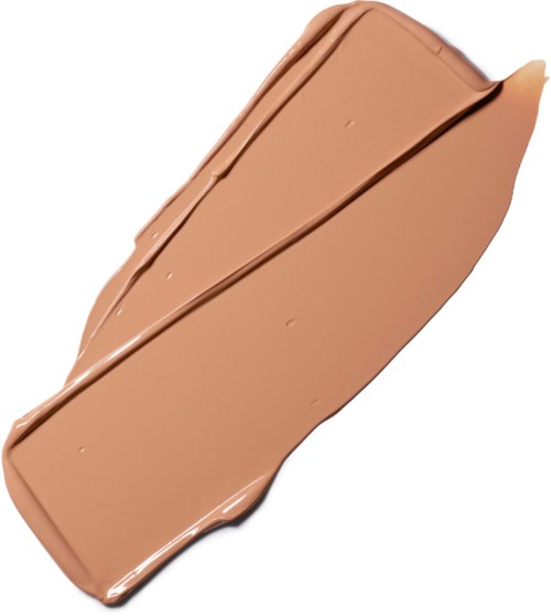 En mjölkchokladkaka med en slät yta och några linjer på toppen.