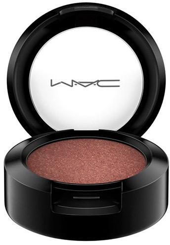 A round black makeup container with blush inside, the lid has the MAC logo on a white background.