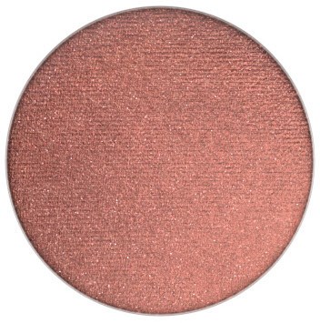 Ein runder Lidschatten mit schimmernder, pfirsich-pinker Farbe und funkelndem Finish.
