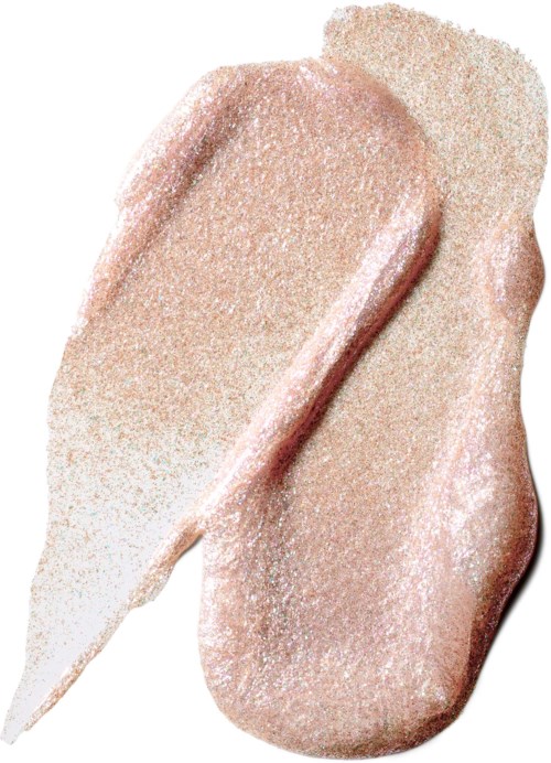 Two pieces of light beige, shimmery makeup or skincare sticks. One is slightly angled, the other lying flat.