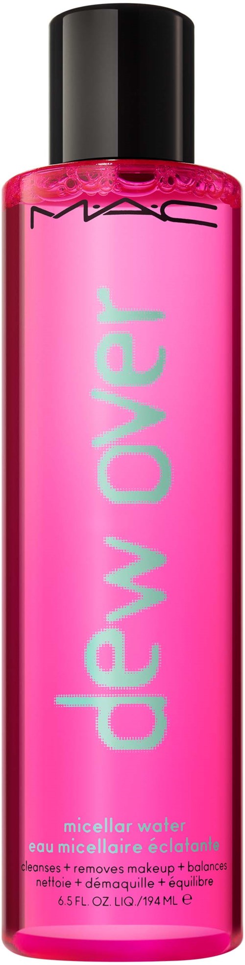A tall pink bottle labeled 'new over' contains MAC micellar water for makeup removal and skin hydration.