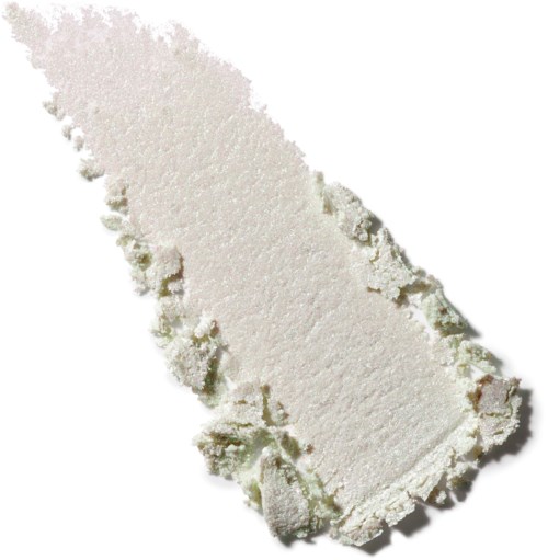 A large, irregular white powdery substance with rough edges on a white background.