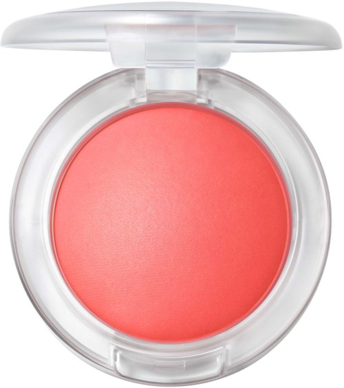 A round coral-colored blush inside a clear plastic compact with a lid. The blush has a smooth surface.