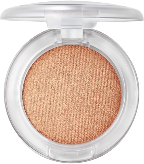 En rund kompaktil med ferskenfarget blush inne og klar lokk.