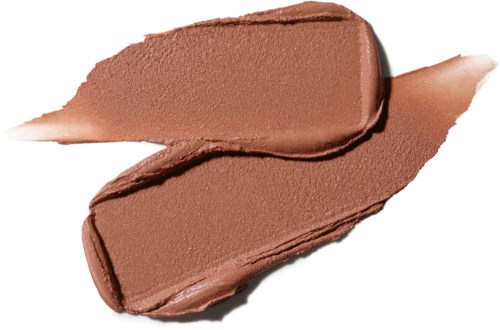 Two broad strokes of brown makeup or cream with smooth and textured parts on a white surface.