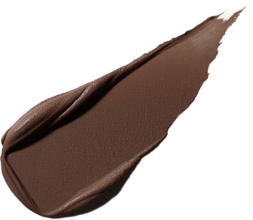 A smear of brown cream or makeup with a pointed tip and smooth texture.