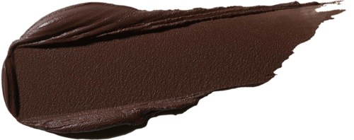 A smear of dark brown makeup or paint with a pointed, torn edge.
