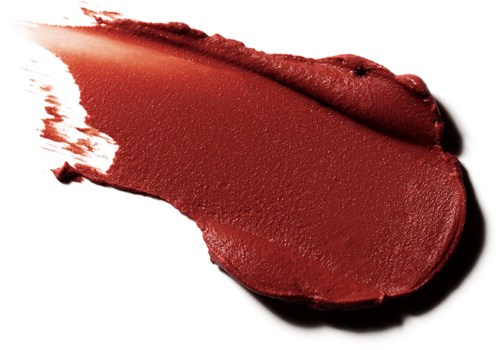 A smear of dark red lipstick with a glossy, smooth texture on a white background.