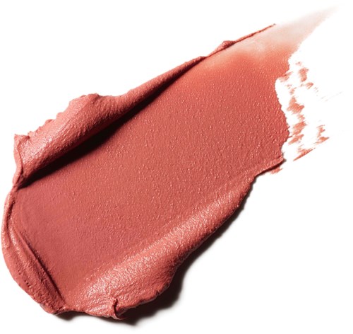 A smear of pinkish-beige makeup or lipstick with a smooth, creamy texture on a white background.