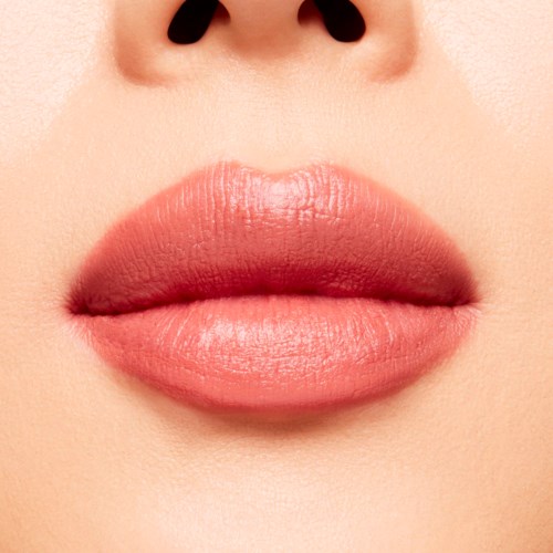 Close-up of full, pink lips with smooth skin, showing the nose above.