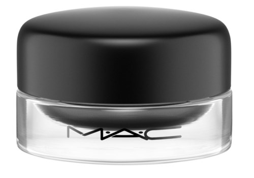A small round container with a black lid and clear base, labeled 'MAC'. It holds cosmetic product.
