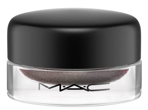 En liten rund behållare med svart lock och klar botten som visar makeup inuti. Märket, MAC, syns på den.