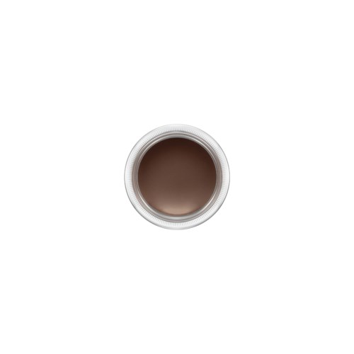A top view of a cup filled with brown coffee or tea on a white background.