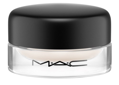 A small jar of MAC cosmetic cream with a black lid and clear bottom showing the brand name.