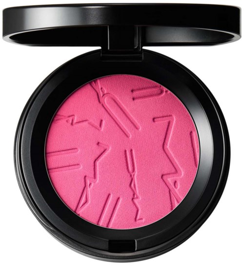 Pink blush with a raised clock design and hour markings, enclosed in a black round compact case.