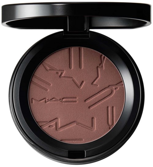 A round makeup compact with a black lid, containing a brownish-pink powder with embossed irregular lines.