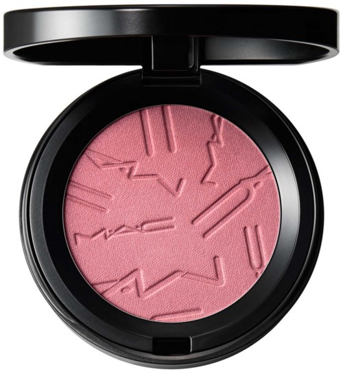 Pink blush with abstract line patterns in a black compact case.