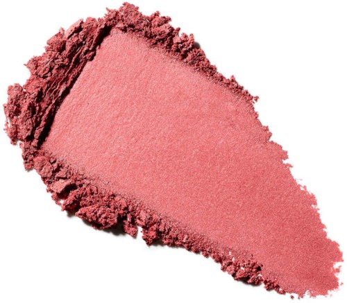 Pink powder makeup with a rough edge and smooth center, spread out on a white background.