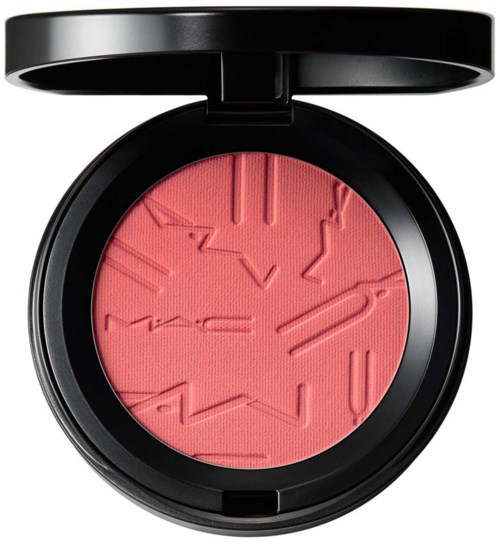 Pink blush with raised, abstract geometric patterns in a black compact case.