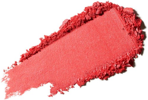 Pink makeup blush spread with some powder around it on a white background.