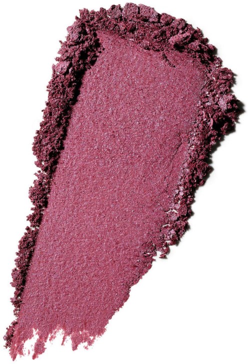 Pink eyeshadow with a dark border, spread out with a rough textured edge.