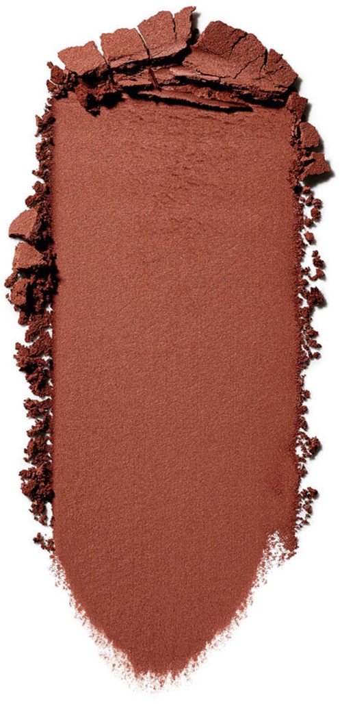 Brown eyeshadow with a rectangular shape, edges are rough and cracked.