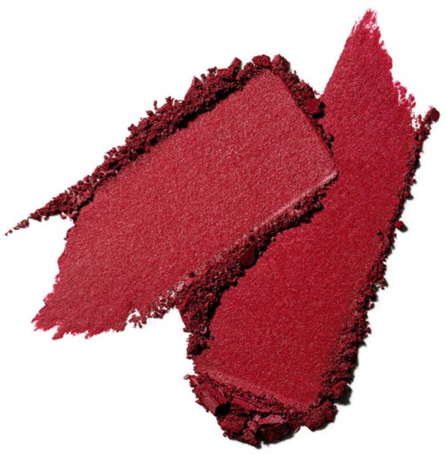 Two red powdery makeup or blush streaks on a white background.