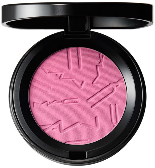 Pink blush with abstract pattern in a black round compact. Open lid showing the textured surface inside.