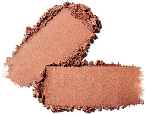 Two peach-colored makeup blush powders, one broken with pieces around, on a white background.