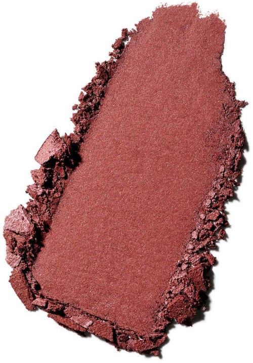 Zerdepperter rosa Lidschatten mit matter Oberfläche und unebenen Kanten.