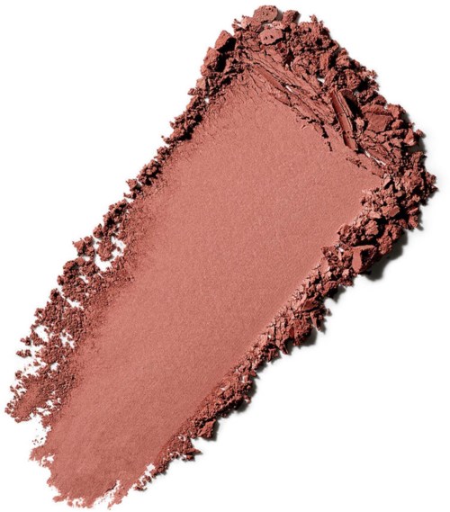 Zerkrümeltes rosa-braunes Pulver ungleichmäßig verteilt, einige Bereiche intakter, herumliegende Partikel.