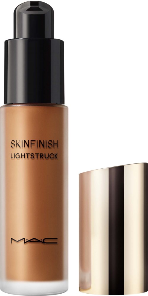 A foundation bottle labeled 'Skinfinish Lightstruck' from MAC, with a black cap and gold-colored lid.